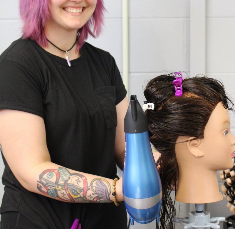 Student Working On Mannequin Hair